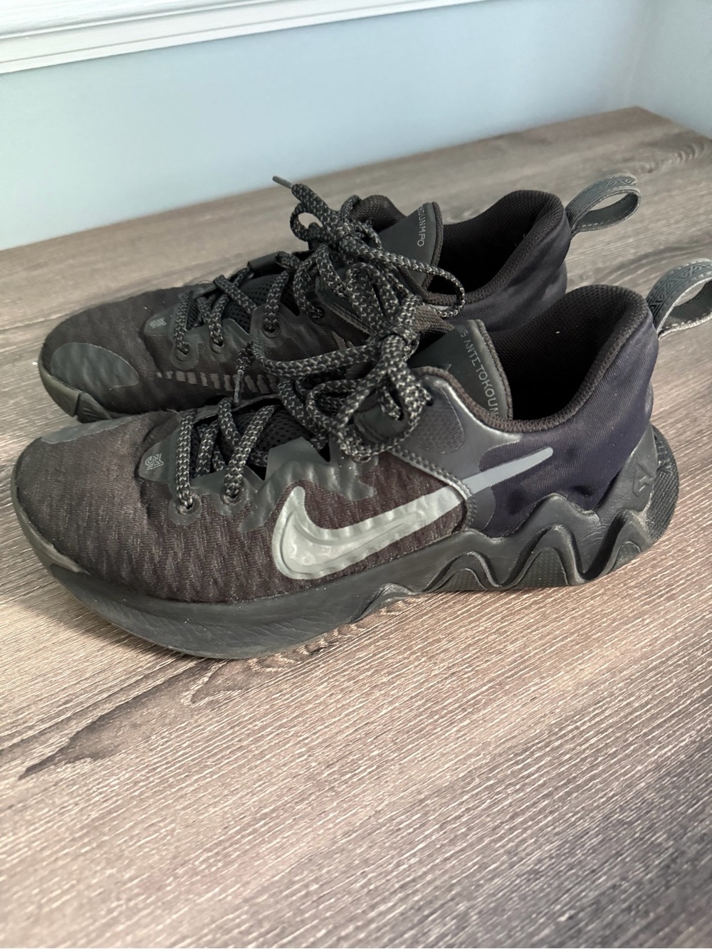 Nike Kids Black Athletic Sneakers with Reflective Swoosh